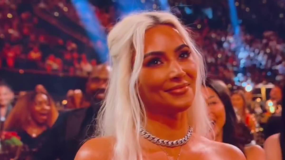 Kim Kardashian looks VERY unimpressed at Tom Brady's jab about  Kanye West and her kids as NFL star turns the tables during his jaw-dropping Netflix Roast