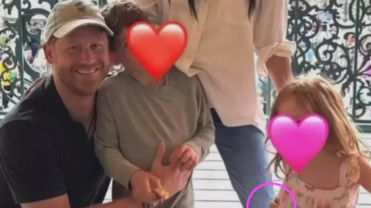 Prince Harry and Meghan Markle's Disneyland family photo sparks wild conspiracy theories: Royal fans claim children were added with AI and a mystery 'disembodied' hand is holding up Lilibet