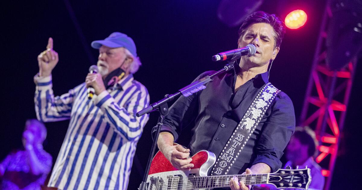 News of Brian Wilson's death left bandmate Mike Love speechless, says honorary Beach Boy John Stamos
