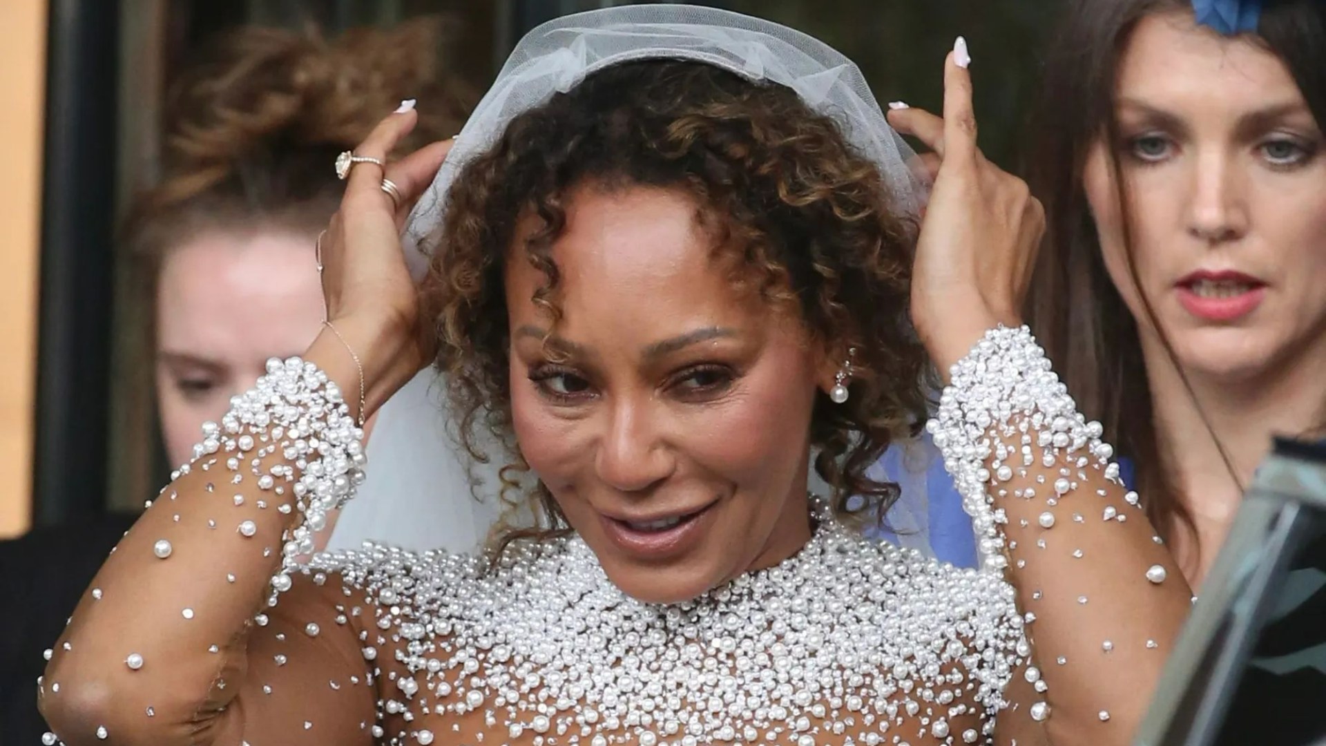 Spice Girl Mel B looks incredible in white gown as she arrives at St Paul's