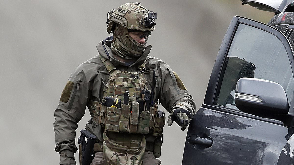 Shots believed to be fired as armoured vehicles and several ambulances swarm on home of alleged sovereign citizen cop killer: Live updates