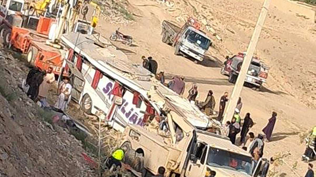 At least 26 people dead and dozens injured as bus rolls down embankment