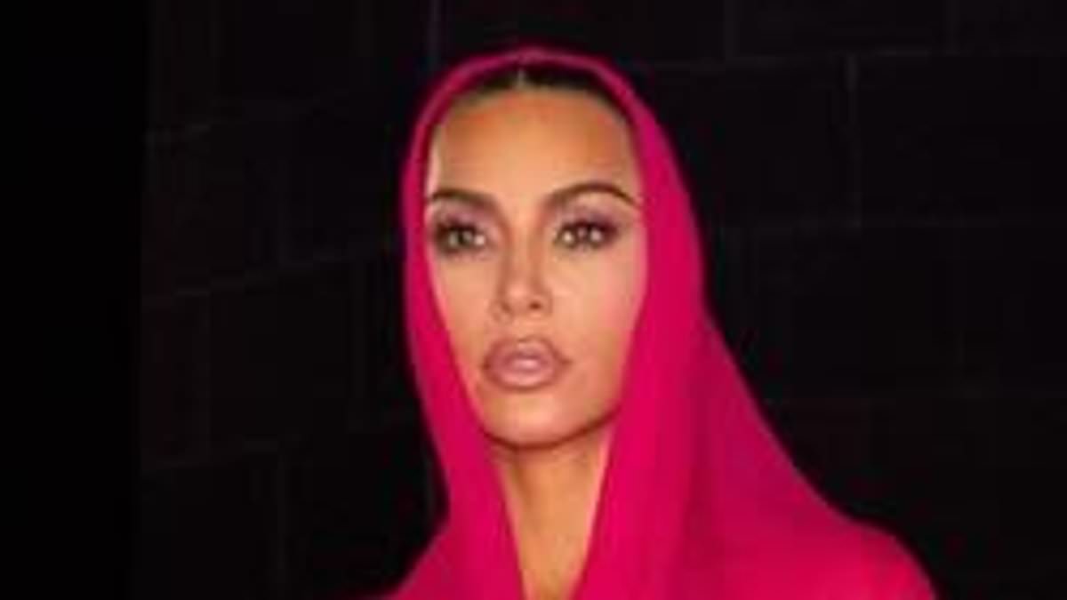 Kim Kardashian sizzles in hot pink dress as she visits Christ the Redeemer statue in Brazil