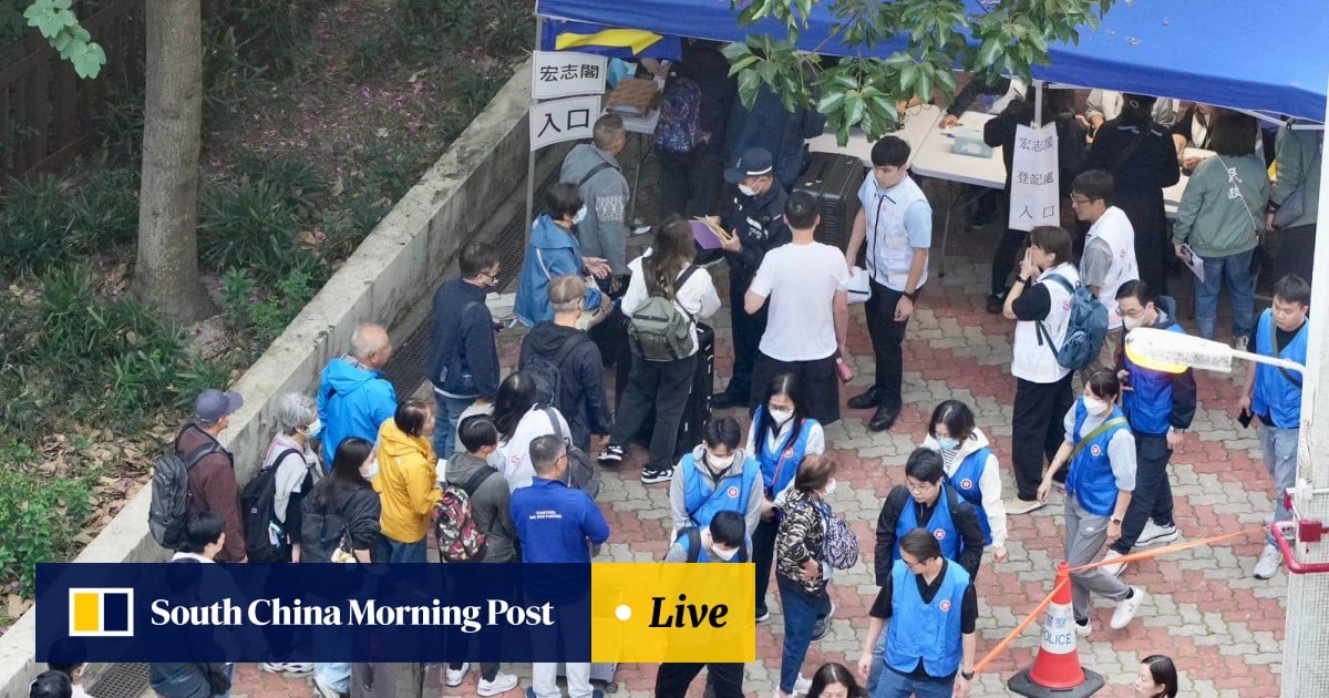 ‘I feel upset’: survivors return to fire-hit Hong Kong estate to collect items