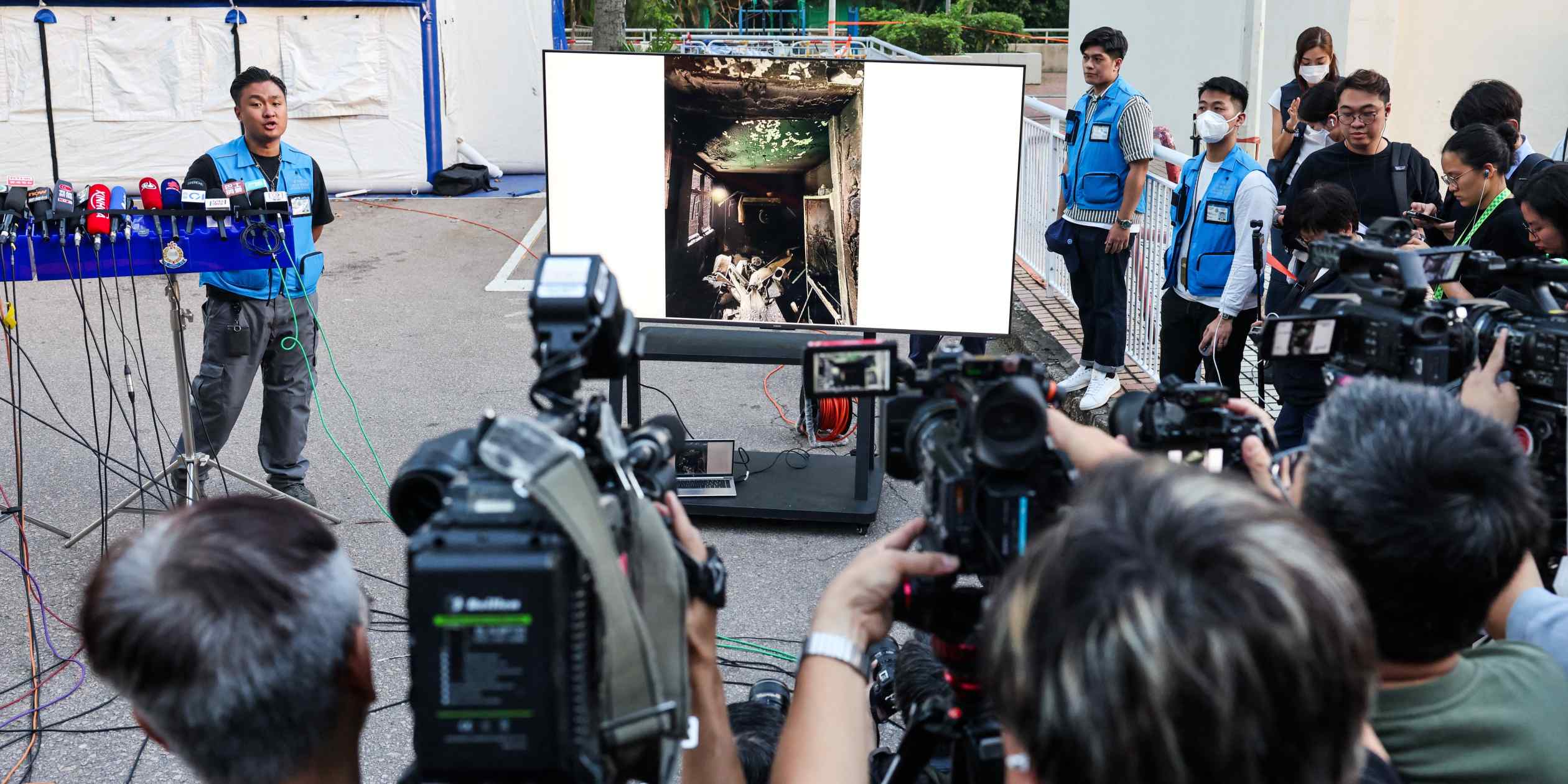 Hong Kong warns foreign news media over fire coverage