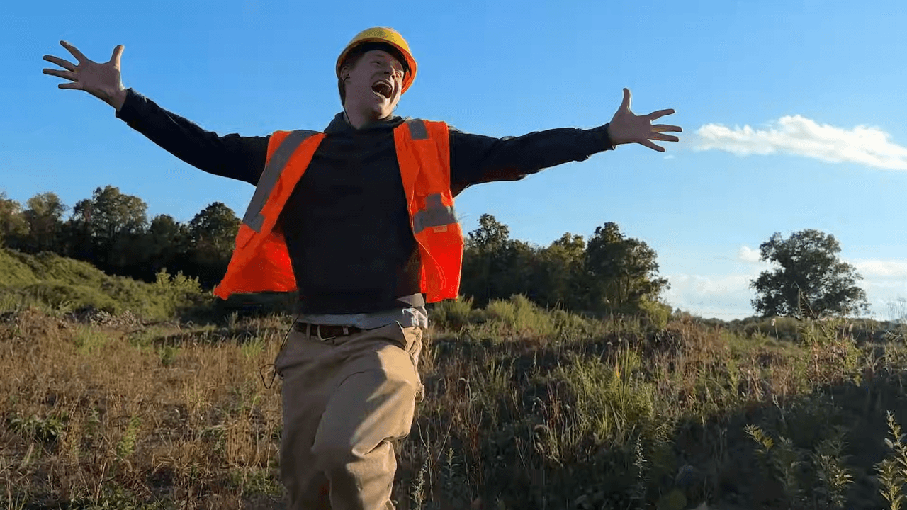 Cameron Winter Makes Lucas Hedges Direct Traffic in “Love Takes Miles” Video