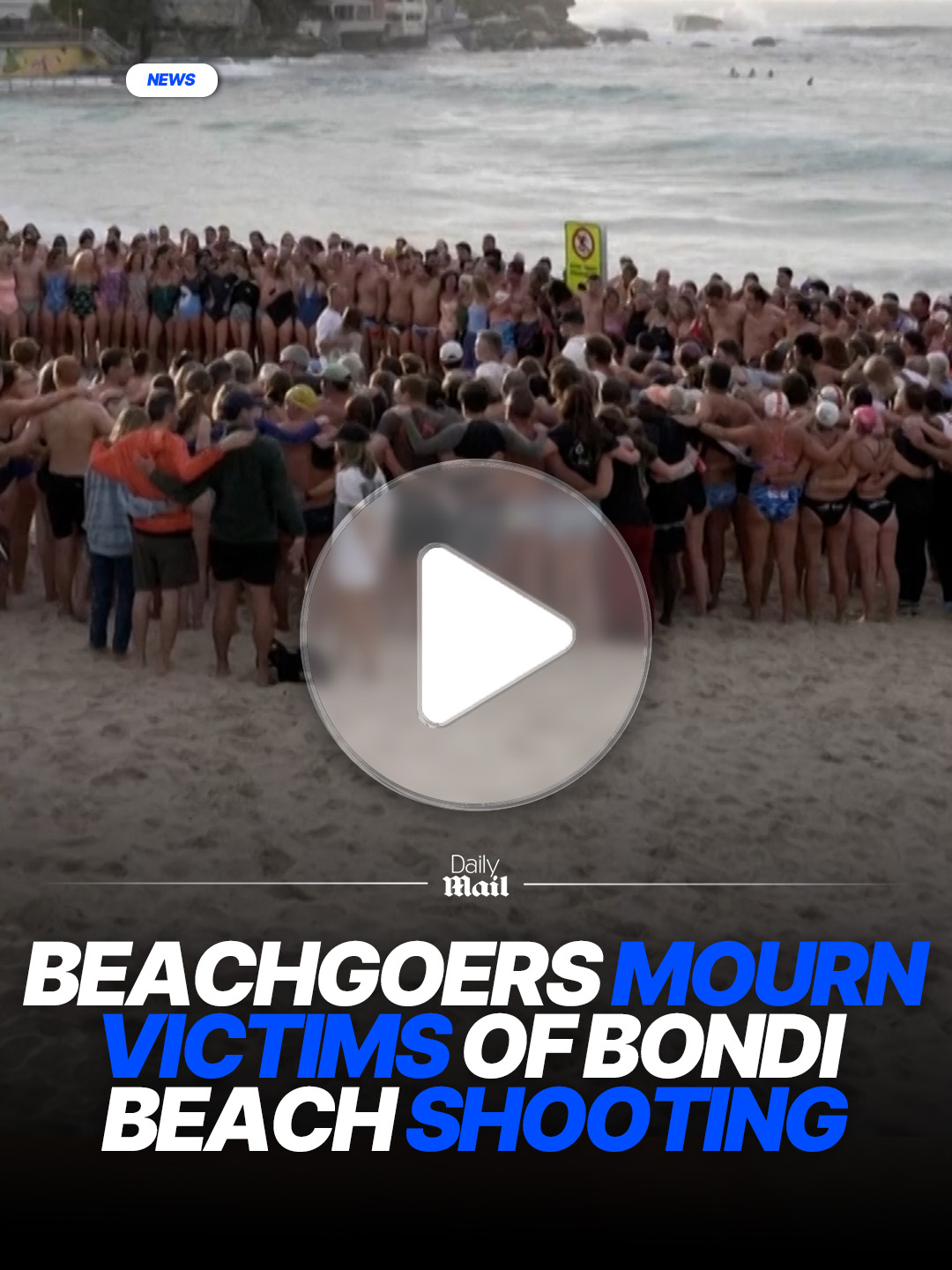 A large group of beachgoers gathered on Sydney's Bondi Beach in their swimwear to mourn the victims of Australia's worst mass shooting in almost 30 years. Dozens of people put their arms around each other as they observed a minute's silence for the 15 people who were killed when a father and son attacked people celebrating Hanukkah on the beach. #bondi #bondibeach #sydney #australia