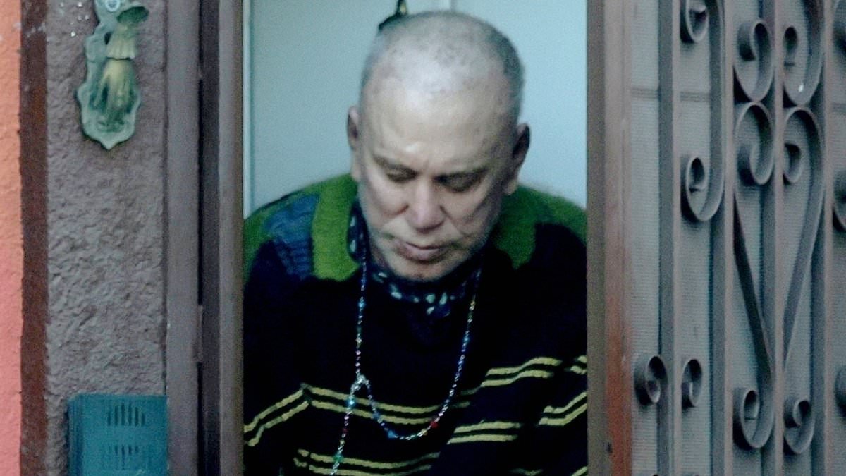 Bald Mickey Rourke, 73, emerges for Taco Bell at LA home he faces eviction from over $60k unpaid rent