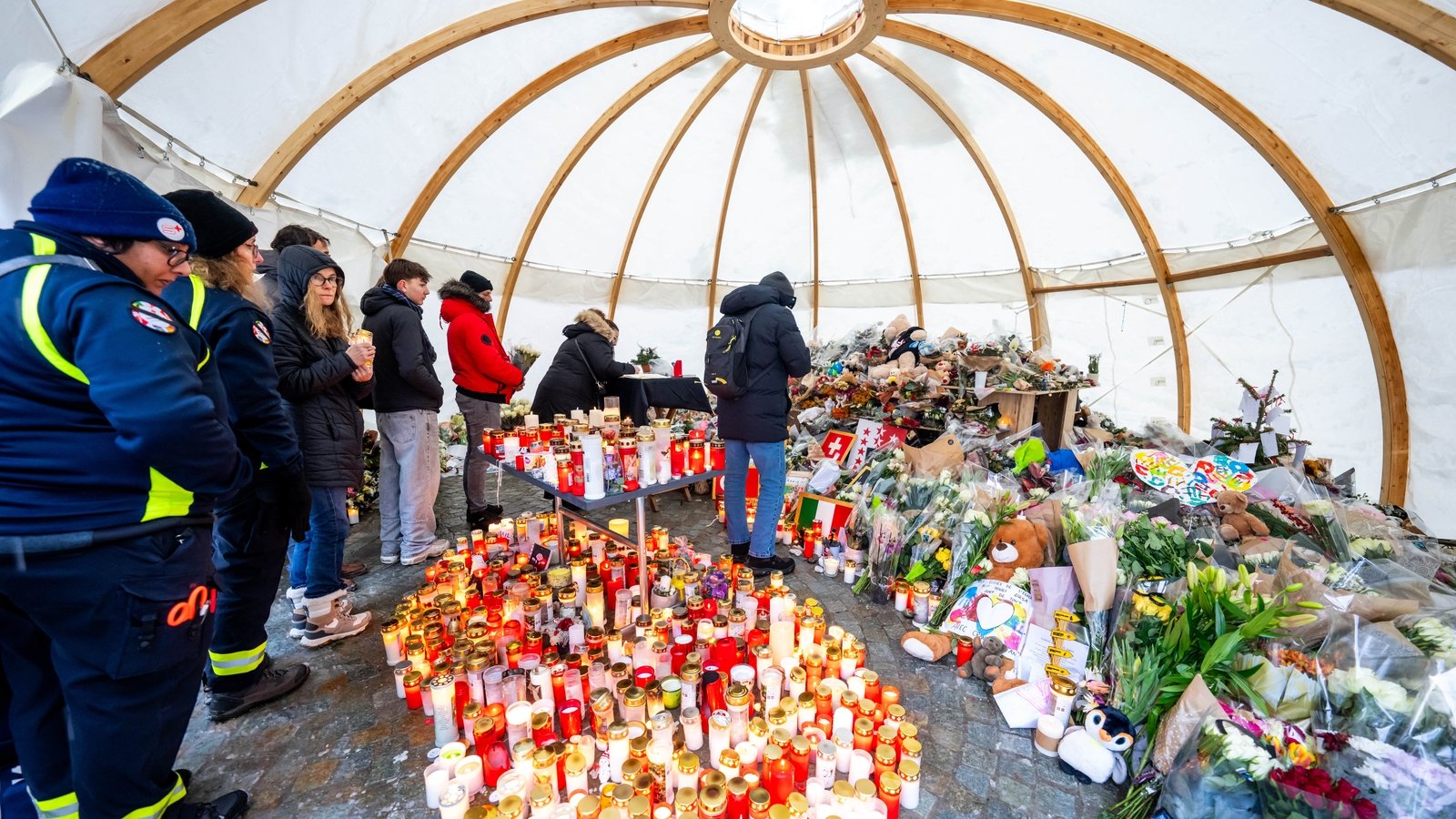 Memorial for Swiss bar fire victims goes on fire - police