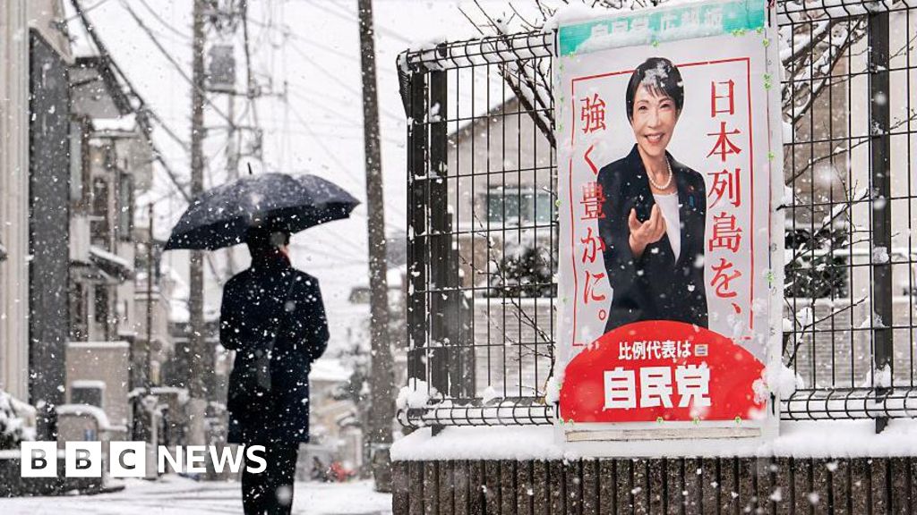 Japan's governing party projected to win snap election majority