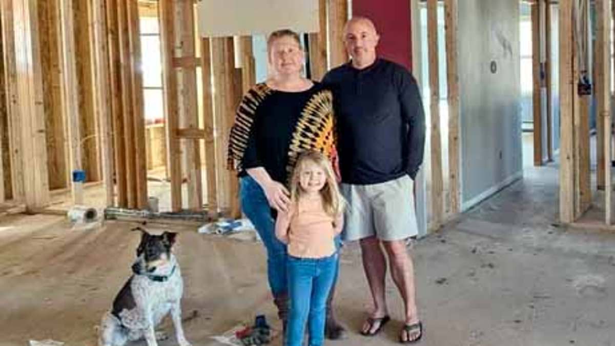 Colorado family forced to sleep in trailer with no running water after they claim contractor 'took $219,000 to rebuild their home then stopped working while building was still a shell'