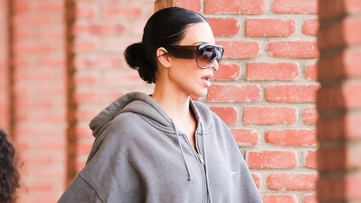 Make-up free Kim Kardashian shows off her off-duty style in a grey tracksuit and Yeezy sliders after Lewis Hamilton was quizzed on their new romance