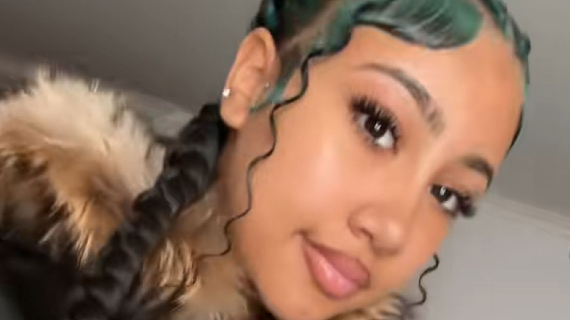 North West shows off TWO new body piercings on Instagram as furious fans slam her mom Kim Kardashian...