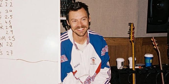 Harry Styles Couldn’t Stop Wearing This 1992 Olympics Adidas Jacket While Making His New Album