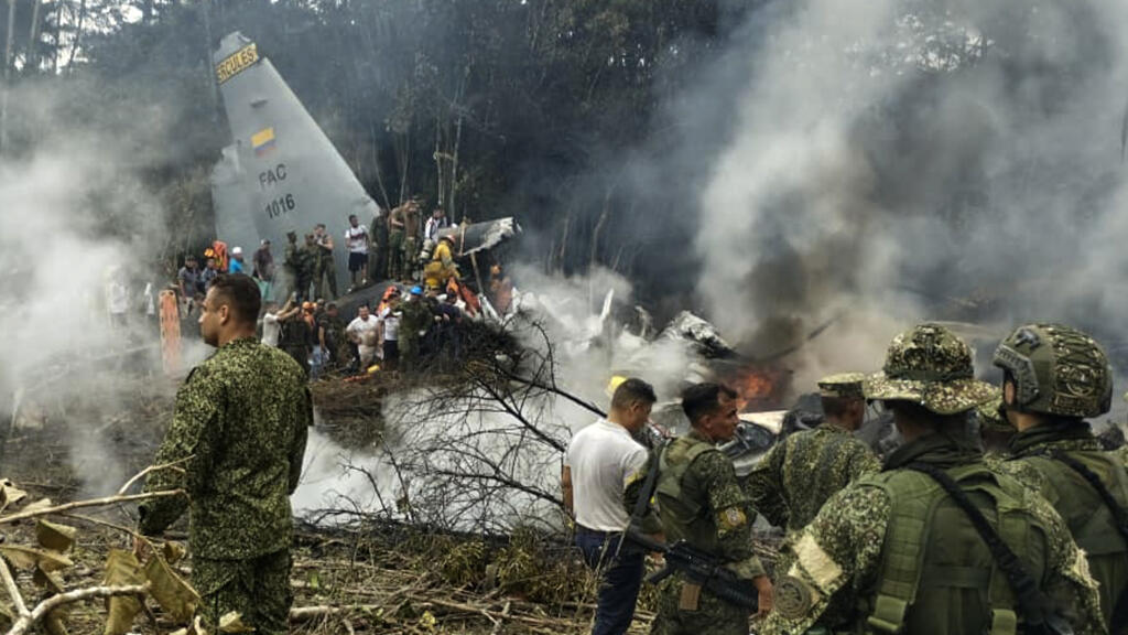 Military transport plane crashes in Colombia with 121 on board, dozens dead