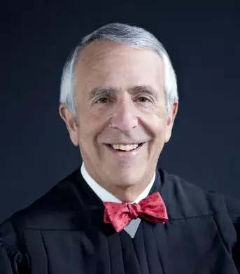 Probability of me getting a fair trial if this is how the judge dresses is 0.0%