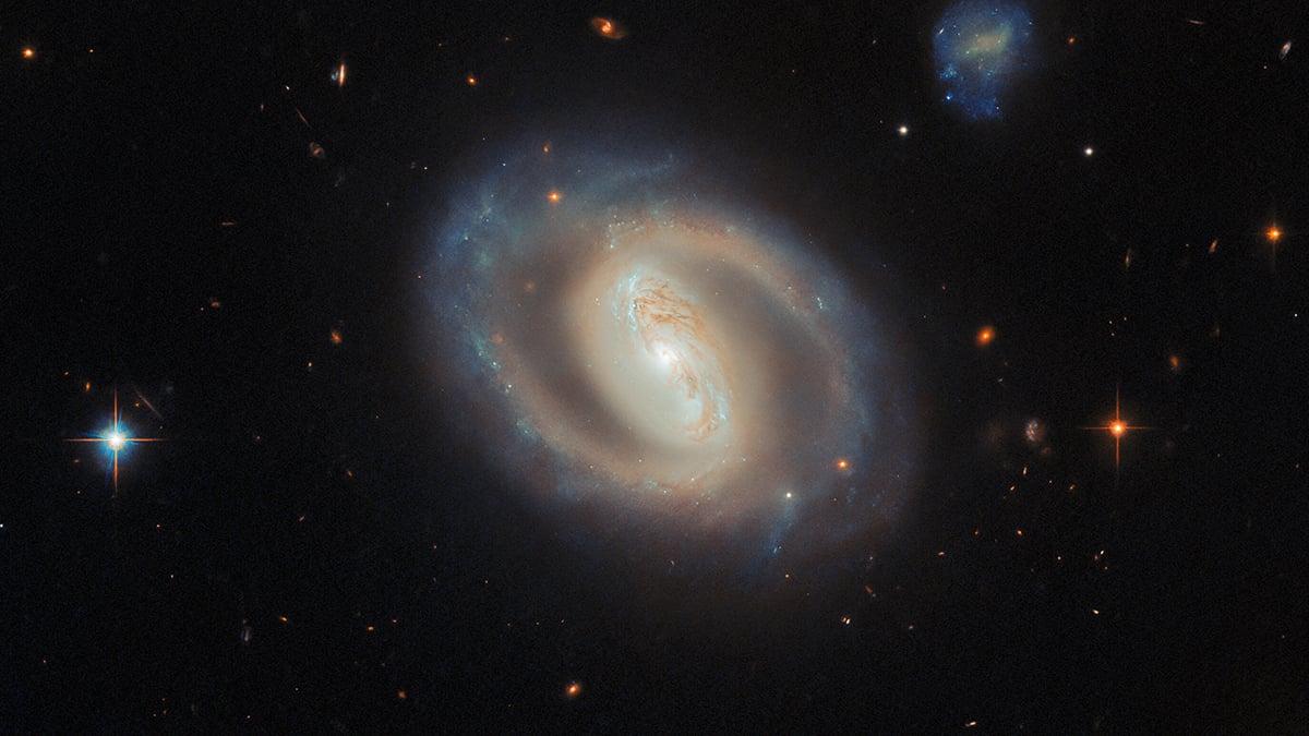 Hubble Captures the Internal Structure of Barred Spiral Galaxy IC 486