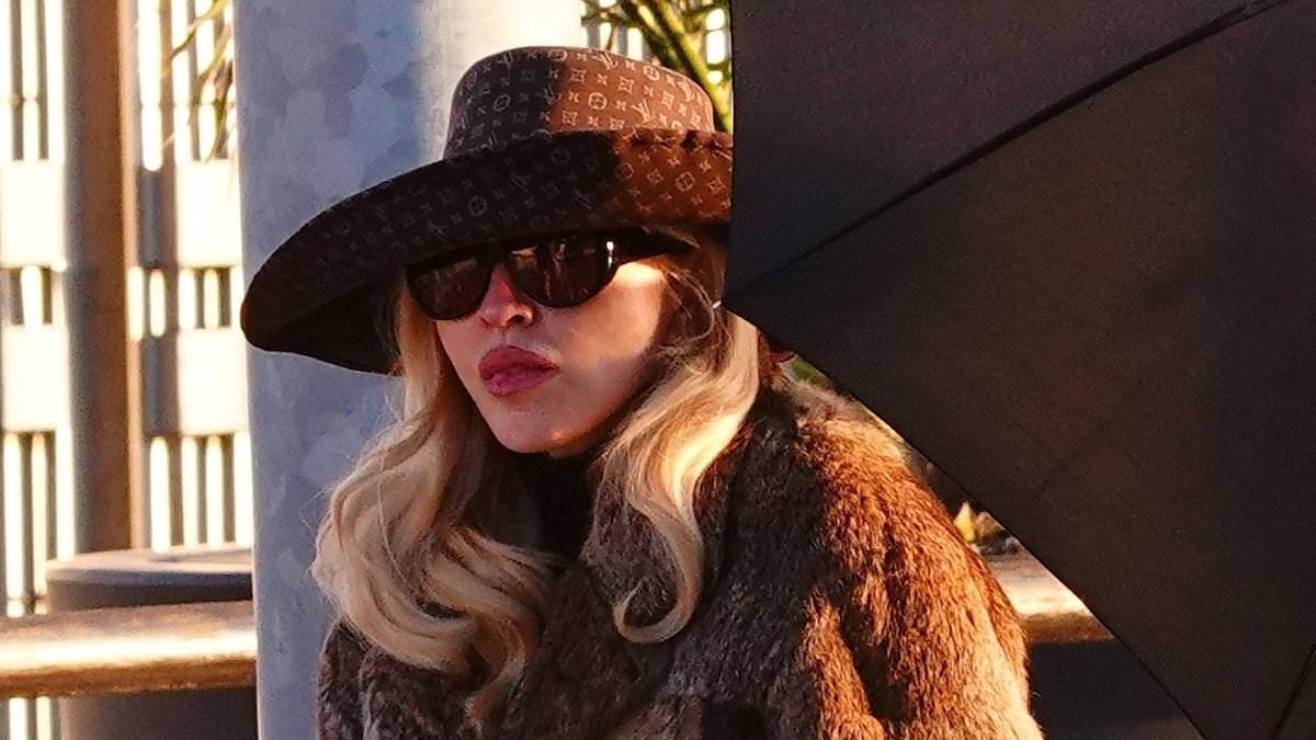 Madonna, 67, wraps up in a fur coat as she enjoys an outing in Venice with her toyboy boyfriend Akeem Morris, 29