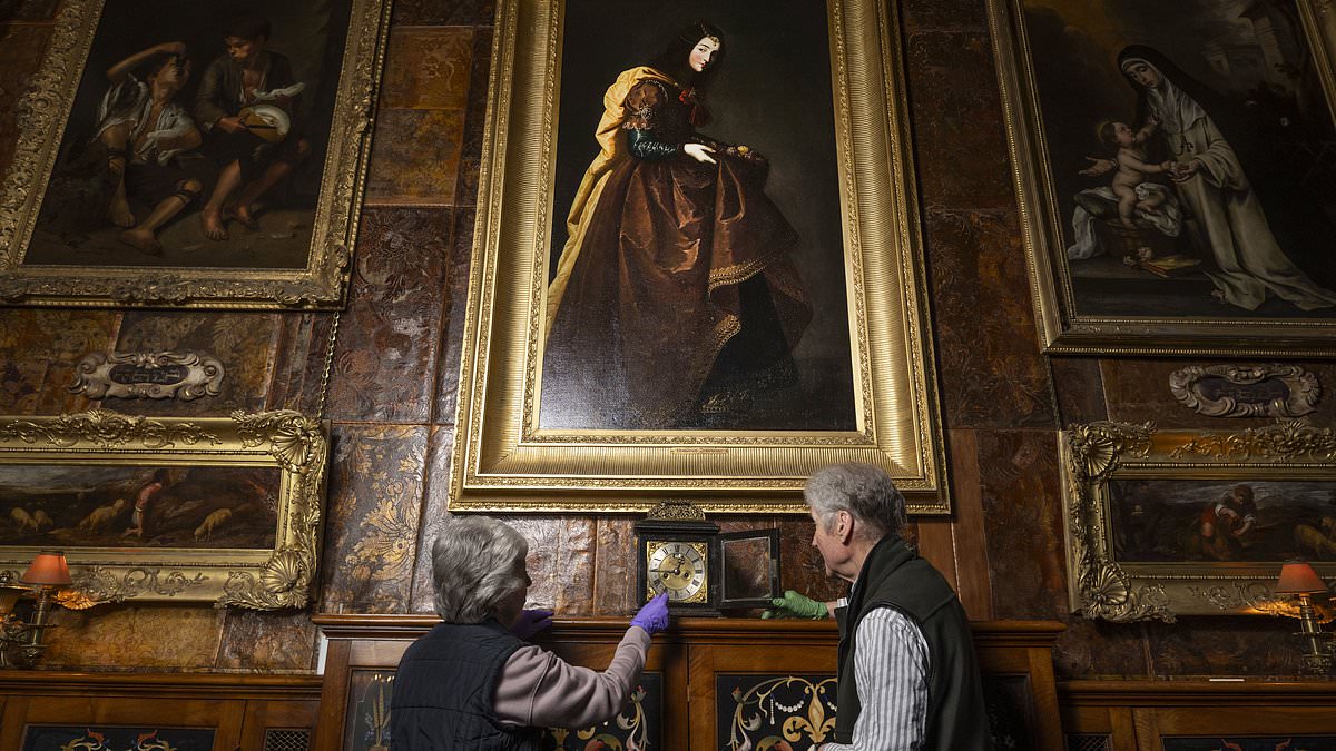 Don't forget! Volunteers adjust historic timepieces at country houses as clocks go forward tonight