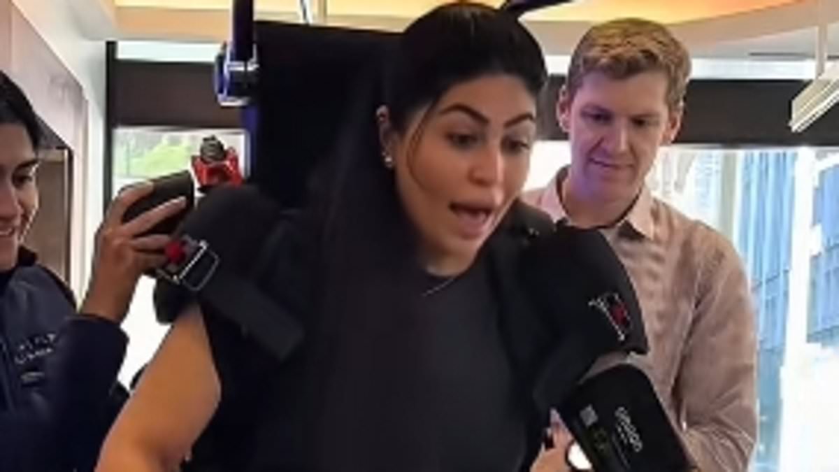 Emotional video shows woman, 27, take her first steps in a DECADE thanks to revolutionary exoskeleton