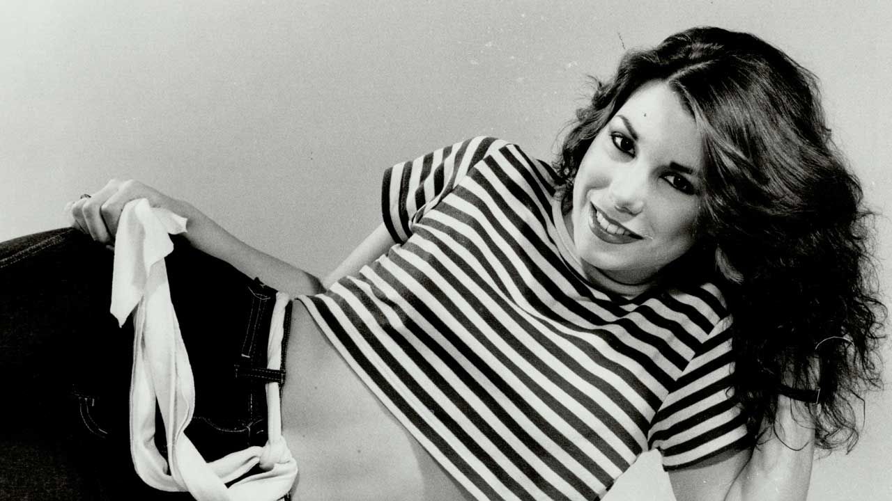 "The album cover and title song video are so sexually potent it almost makes you forget how Canadian the rest of the record is."  What happened when Lee Aaron declared herself the Metal Queen